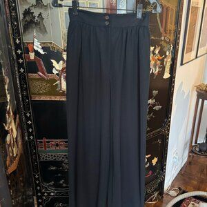 Vintage Giorgio Armani wide-leg black trousers, made in Italy. Features double b